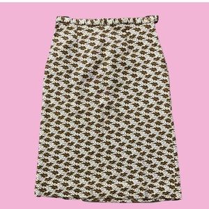Vintage 70s knee length patterned skirt
Would best fit a size XS/S